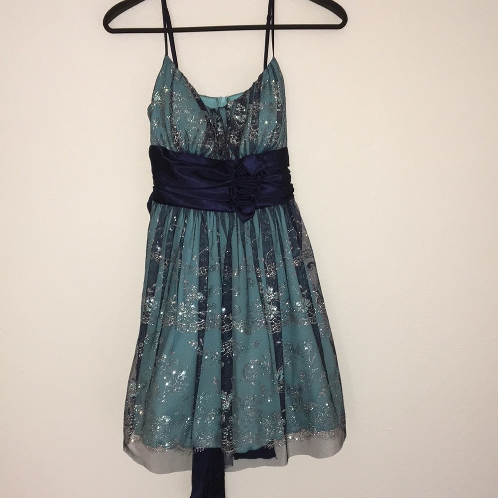 Beautiful shimmering Blue and silver dress. Made by Beats Studio Los Angeles.